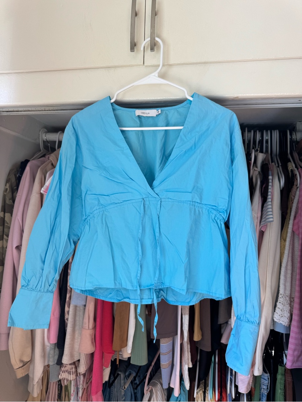 Greylin Sky Blue V-Neck Peplum Long-Sleeve Blouse
